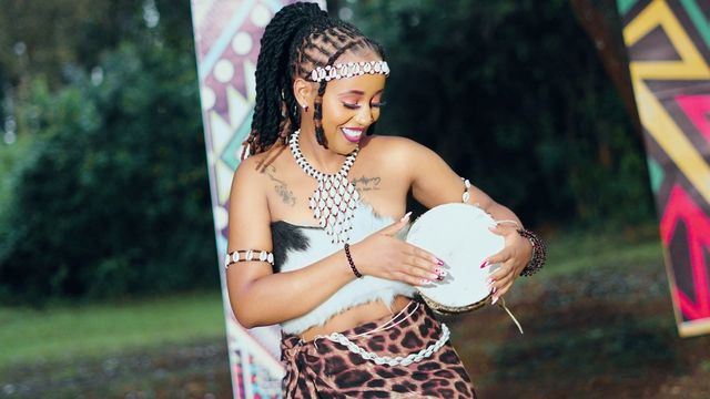 Traditional drummer on location for the Ndikuinuka music video